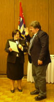 D/Cdr. Sandra Pierog administers the oath to Cdr. William Weidner.