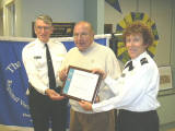 P/C Peter Jenkin, SN, and P/C Nancy Miller, SN, recognize Arthur Ferrucci for fifty years membership.