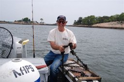 Mark Cisto helps setup the NHPS mooring buoy for summer use