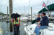 Cdr. Kim Chieppo, P, and Safety Officer Art Andrea , P, provide Channel 8 viewers with tips on boating safety.